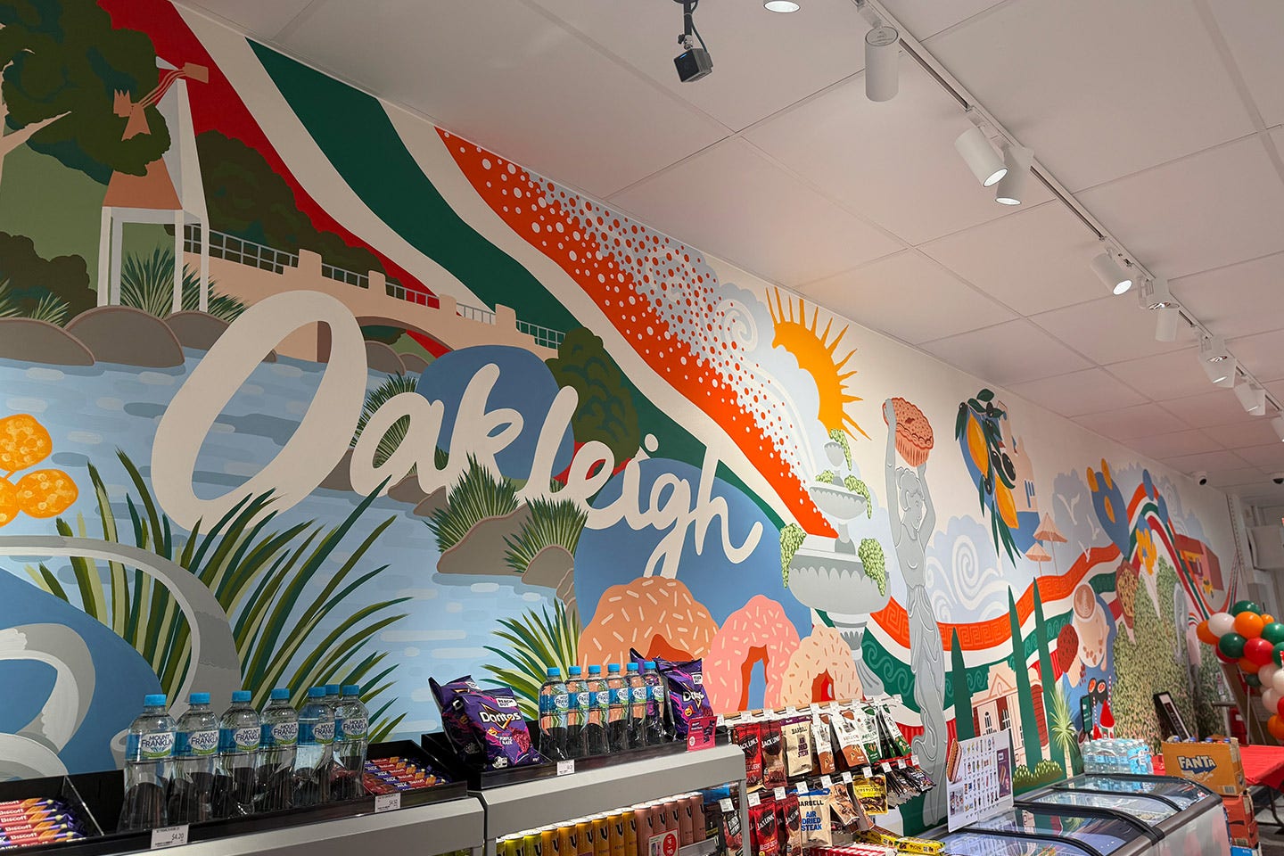Team celebraing the re-launch of 7-Eleven Oakleigh